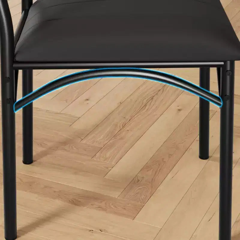 Four dining chair sets, with soft cushions and ergonomic high backs. Strong steel legs, suitable for dining rooms and kitchens. Black color.