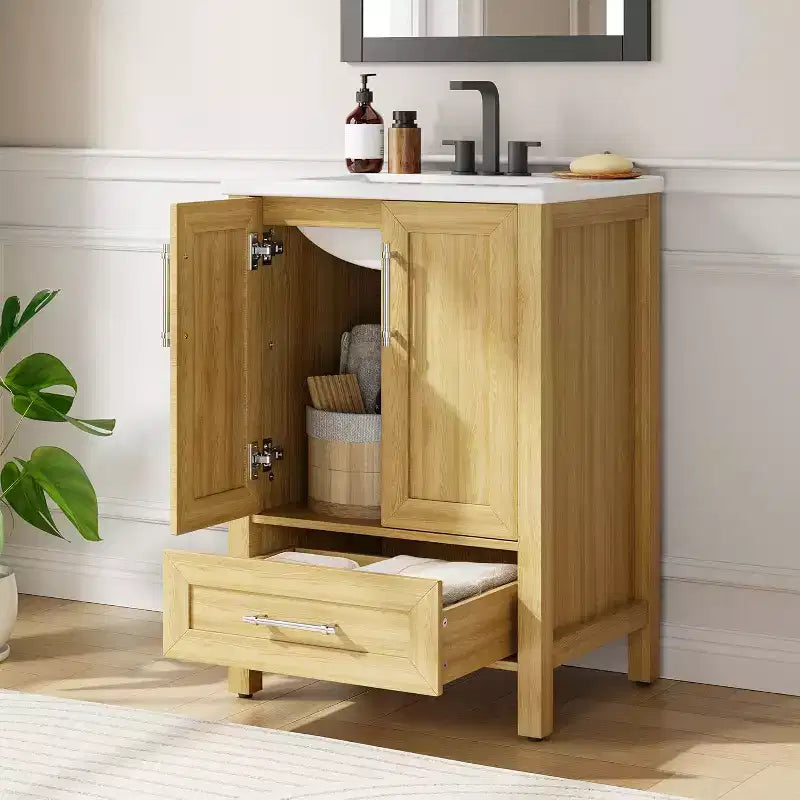 Meuble-lavabo de salle de bain en bois autoportant de 76 cm avec lavabo, porte à fermeture douce et poignée en métal. Rangement moderne pour petits espaces, bois naturel.