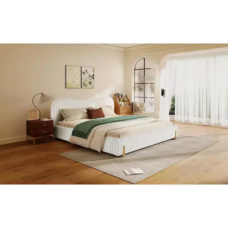 White Plush Upholstered Bed Frame with Wavy Headboard, Vertical Stitching and Warm Wood Legs for Elegant Contemporary Bedrooms, King