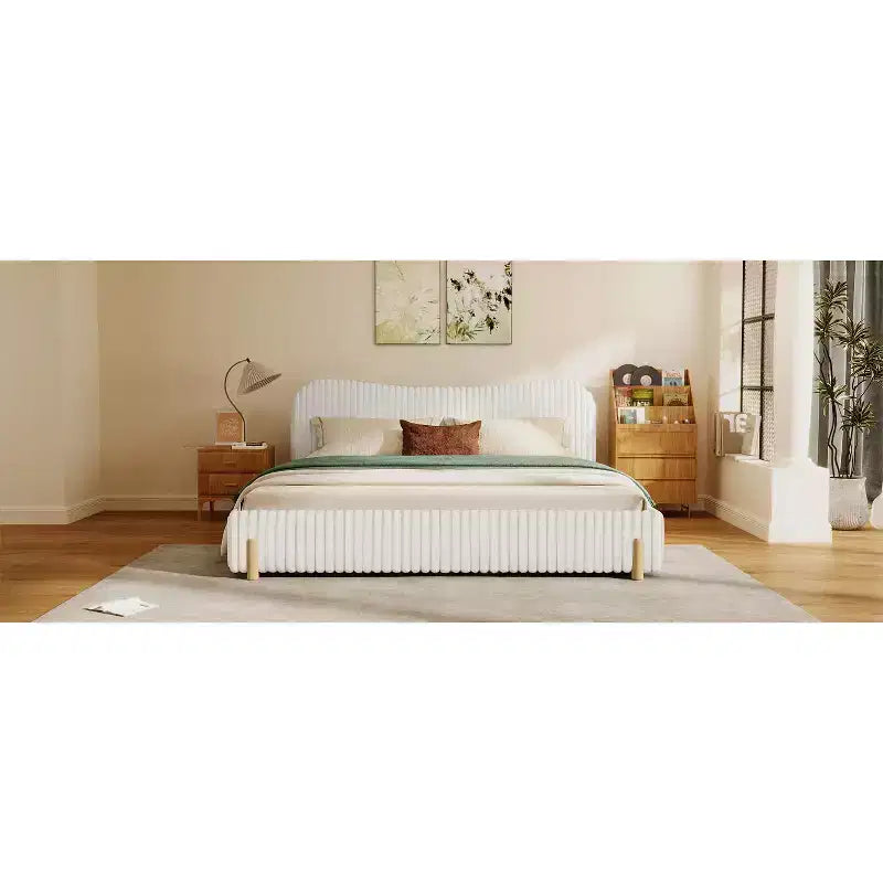 White Plush Upholstered Bed Frame with Wavy Headboard, Vertical Stitching and Warm Wood Legs for Elegant Contemporary Bedrooms, King