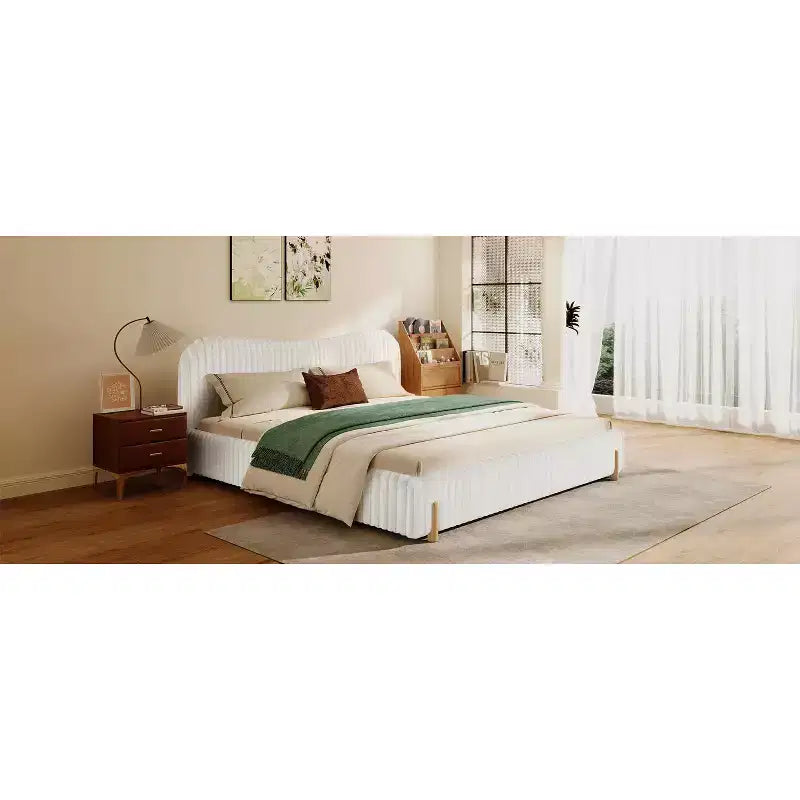 White Plush Upholstered Bed Frame with Wavy Headboard, Vertical Stitching and Warm Wood Legs for Elegant Contemporary Bedrooms, King