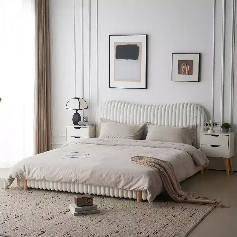 White Plush Upholstered Bed Frame with Wavy Headboard, Vertical Stitching and Warm Wood Legs for Elegant Contemporary Bedrooms, King