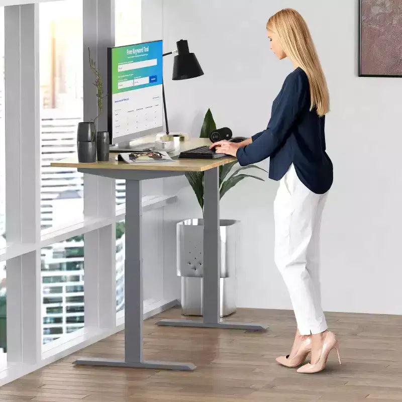 27 Electric Standing Desk with Adjustability Natural Bamboo - Uncaged Ergonomics