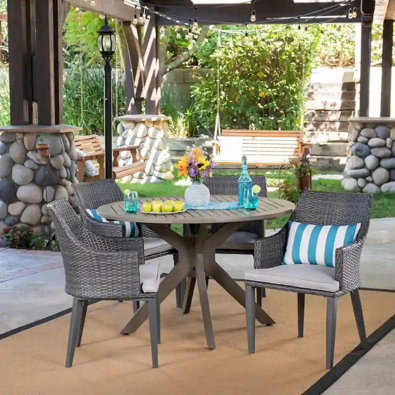 Ensemble de salle à manger rond 5 pièces en osier et bois avec coussins Ryan Outdoor de Christopher Knight Home
