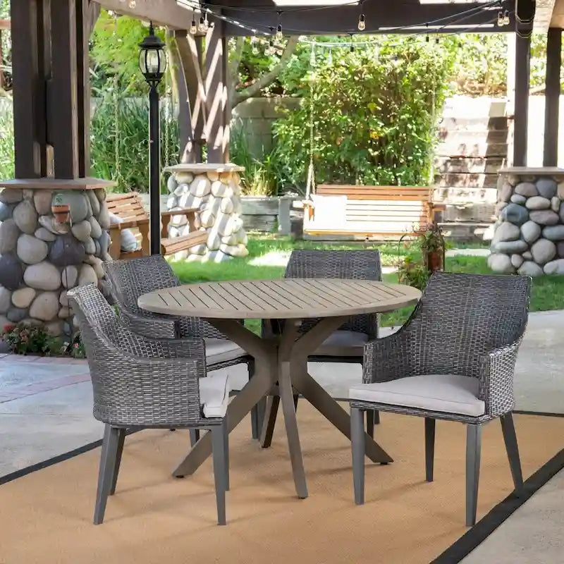 Ensemble de salle à manger rond 5 pièces en osier et bois avec coussins Ryan Outdoor de Christopher Knight Home