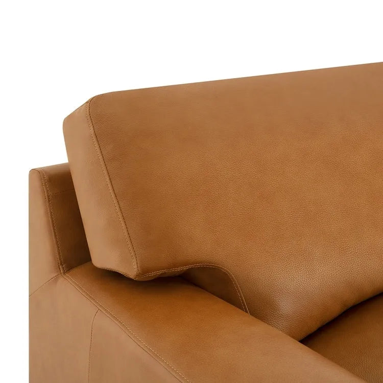Canapé en cuir véritable au confort luxueux, garnissage en plumes d'oie, accoudoirs carrés, pieds blocs robustes