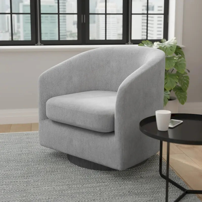 Fauteuil baquet avec piètement pivotant à 360° gainé de vinyle