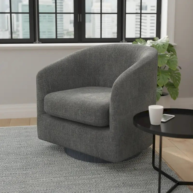 Fauteuil baquet avec piètement pivotant à 360° gainé de vinyle